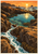 Sunlit turquoise tide pool surrounded by dark rocks, with incoming foam and a small pale crab on a ledge.