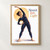 Adult dancer in dark-blue practice clothes holding a standing side stretch beneath the title Stretch Into Light, with an ochre circle behind her.; frame shown for styling only