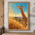 Young giraffe in profile lifting its muzzle toward drifting grass seeds above golden savanna grass, with distant acacia trees.; frame shown for styling only