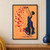 Adult dancer in an indigo dress lifting a bowl overhead as colorful petals cascade across an apricot background.; frame shown for styling only