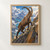 Brown ibex with long ridged horns climbing an ochre rocky slope above a turquoise lake and snowy alpine peaks.; frame shown for styling only
