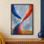 Curved blue and vermilion-orange bands cross at the center over a pale gray-blue background, with fine arcs and ochre at the bottom.; frame shown for styling only