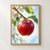 A ripe red apple with water droplets hangs from a leafy branch with pale blossoms and a tiny red-and-black insect.; frame shown for styling only