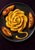 Glossy golden mustard arranged in a flower-like spiral on a dark plate with three roasted potato wedges.