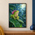 Bright green frog in a magenta hood crouching on a tropical leaf beneath a large suspended raindrop in heavy rain.; frame shown for styling only