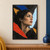 Adult woman in a right-facing profile, looking toward pale-blue light amid bold torn-looking black, blue, red, and ochre shapes.; frame shown for styling only