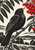 A blackbird perches on a diagonal branch beside scarlet rowan berries and dark leaves, with a distant landscape behind it.