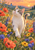 A white-and-gray cat with a raised paw walks through coral, yellow, and violet wildflowers as a blue butterfly hovers near its ear.
