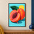 Whole and cut coral-red peach with exposed dark pit, green leaf, yellow sun disc, and two droplets on a turquoise background.; frame shown for styling only