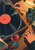 Overhead view of a vinyl record and turntable with a hand guiding the tonearm, another hand tapping nearby, and a stemmed red drink on the table.