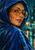 Close-up portrait of a woman in a cobalt hood and translucent amber glasses, turning toward the viewer with a raindrop on her cheek.