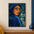 Close-up portrait of a woman in a cobalt hood and translucent amber glasses, turning toward the viewer with a raindrop on her cheek.; frame shown for styling only