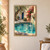 Turquoise courtyard basin with rippling water beneath a stone spout, framed by olive branches, pink bougainvillea, and a blue doorway.; frame shown for styling only