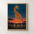 A young giraffe bends its neck toward a glowing insect beneath a deep teal twilight sky, with acacia silhouettes and an orange horizon.; frame shown for styling only