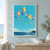 Six colorful patterned kites with thin strings fly across a turquoise sky above clouds, sea, and a distant headland.; frame shown for styling only