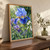 A large blue-violet iris beaded with water droplets rises above long leaves and smaller purple and white flowers.; frame shown for styling only