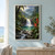 Waterfall descending over a rocky ledge into a green-blue pool in a tropical ravine, framed by ferns, palm trunk, leaves, and red flowers.; frame shown for styling only