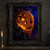Glowing carved pumpkin mask with two star-shaped openings and a crescent grin, framed by dark leaves.; frame shown for styling only