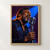 Close portrait of a dark-skinned blues singer with eyes closed beside a silver microphone against cobalt and plum lighting.; frame shown for styling only