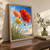 Three red, coral, and golden poppy-like flowers rise on curved stems against a blue sky above a meadow.; frame shown for styling only