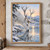 White stag lowering its muzzle to a snowy river at dawn, with antlers above the water and a sunrise reflection.; frame shown for styling only