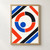 Four separated colored arcs form a central ring around a small cobalt disk, with diagonal bands across a warm-white ground.; frame shown for styling only