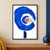 Large textured cobalt spiral surrounding a coral oval and three mint-green shapes, with a navy vertical mark below on white.; frame shown for styling only