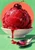 Vivid red cherry sorbet scoop topped with a dark cherry on a white saucer, with dripping syrup and a metal spoon against mint green and coral.