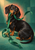 Black-and-tan dachshund holding a green ribbon, with ribbon loops and a brass key against a teal and coral background.