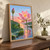 Open pink lotus above reflective pond water, with an upright bud, broad green leaves, a water droplet and coral sunset reflection.; frame shown for styling only