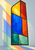 Tall asymmetrical window with six colored panes casting angular colored light on a pale wall and floor.