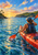 Rear-view paddler in a red-orange kayak crossing bright blue water toward a green headland and tiny sail.