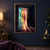 A figure faces a glowing teal, saffron and rose doorway as several figures proceed through it in a dim room.; frame shown for styling only
