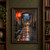 A glowing red lantern hangs beneath a stone arch above a rainy passage with receding lanterns and a distant umbrella figure.; frame shown for styling only