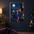 Woman in a cobalt robe raising a decorated teacup beside a large moon and illuminated waterfront city window.; frame shown for styling only