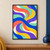Broad coral, cobalt, gold, mint, violet, and warm white ribbons interweave in flowing curves across the full poster.; frame shown for styling only