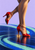 Dancer’s crossed lower legs in red heeled shoes, one grounded and one lifted, above a dark blue floor with mint and cobalt arcs.