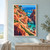Winding pale stone stairs descend through terracotta cliffs toward turquoise water and a blue sea.; frame shown for styling only