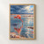 Coral-red flamingo standing in rippled turquoise water, reflected beneath indigo storm clouds and layered mineral ridges.; frame shown for styling only