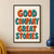 Four stacked lines reading GOOD COMPANY GREAT STORIES in terracotta and turquoise ceramic-like illustrated letters on cream.; frame shown for styling only