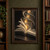 An open book on a dark table transforms into a warm, spiral library of curved shelves and stairs against a near-black background.; frame shown for styling only