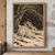 Pale hare crouching in snow beneath sweeping dark branches, rendered in warm-black and ivory engraved-style marks with sparse rust accents.; frame shown for styling only