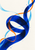 Dark ultramarine ribbon forms a central loop with orange and pale-cyan crossings and small ink-like flecks on warm white.