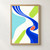 Layered ultramarine and cobalt bands curve around a coral oval, with lime and turquoise shapes and a small gold dot on warm white.; frame shown for styling only