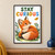 Orange-and-cream fox cub curled on grass looking up at a floating golden leaf beneath the words “STAY CURIOUS,” with leafy sprigs around it.; frame shown for styling only