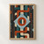 Geometric woven pattern with a pale-blue central diamond crossed by a rust ring, surrounded by interlocking bands and dotted columns.; frame shown for styling only
