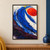 Textured cobalt-blue brushstroke curling around a vermilion oval on warm white, with dark plum shapes along the bottom.; frame shown for styling only