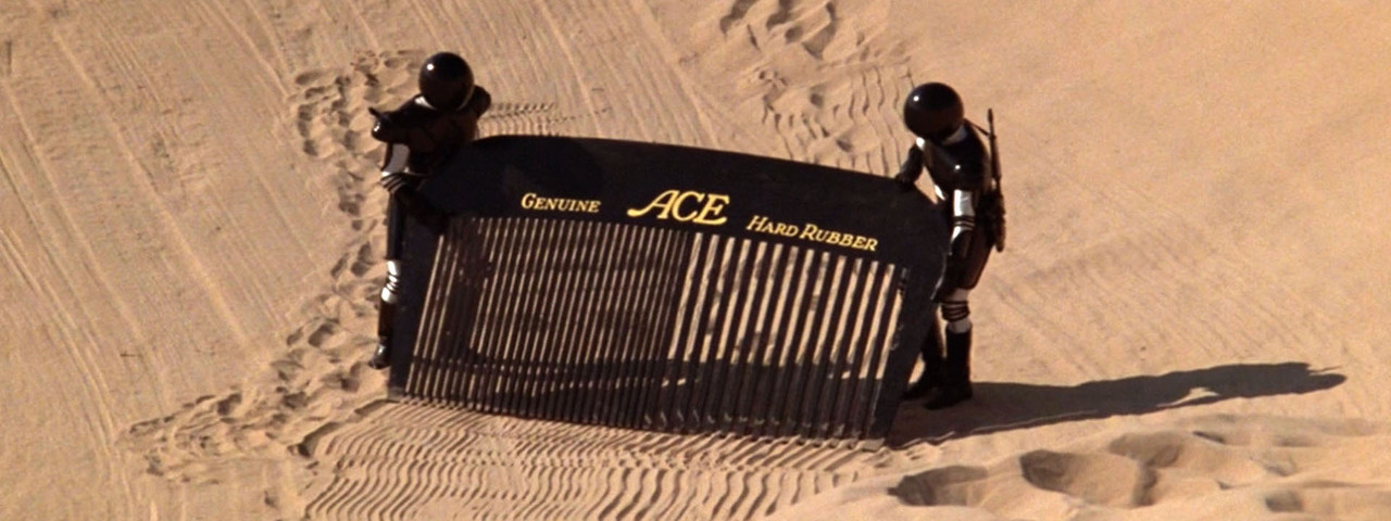 Spaceballs combing the desert with a giant comb