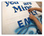 Counting the personalized letters for the baptism celebration banner