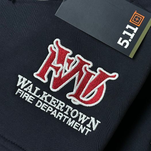 custom embroidered wfd in red outlined in white on navy 5.11 job shirt left chest